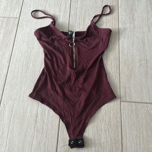 NWT Maroon zip up bodysuit